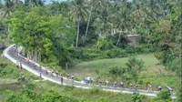 Tour de Singkarak berakhir dengan menampilkan Amir Koladouz sebagai juara sejati dengan memborong tiga jersey (Erinaldi/Liputan6.com)