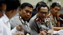 Kapolri Jendral Pol Tito Karnavian mengikuti rapat dengar pendapat umum (RDPU) dengan Komisi III DPR, Jakarta, Rabu (12/10). RDPU juga membahas penanganan sejumlah kasus seperti terorisme, korupsi dan narkotika. (Liputan6.com/Johan Tallo)