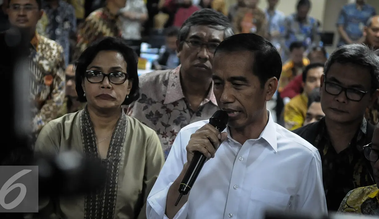 Jokowi menyatakan animo masyarakat yang besar terhadap kebijakan amnesti pajak merupakan momentum untuk memperbaiki sistem perpajakan di Indonesia, Jakarta, Jumat (30/9). (Liputan6.com/Faizal Fanani)