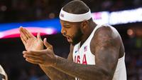 Pebasket AS, DeMarcus Cousins, merayakan kemenangan atas Argentina pada laga ekshibisi menjelang Olimpiade 2016 di Las Vegas, Sabtu (23/7/2016) WIB. (Fox Sports)