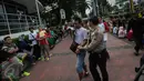 Seorang pria dibekuk usai kepergok mencopet saat car free day di kawasan Bundaran HI, Jakarta, Minggu (15/1). Pria bernama Rio itu kepergok saat mengambil ponsel seorang pengunjung CFD. (Liputan6.com/Faizal Fanani)