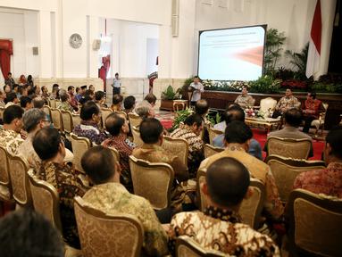 Suasana pada acara penandatanganan MoU kementerian dan institusi penegak hukum, Jakarta (28/1). MoU tersebut mengenai pengembangan sistem database penanganan perkara tindak pidana secara terpadu berbasis teknologi informasi. (Liputan6.com/Faizal Fanani)