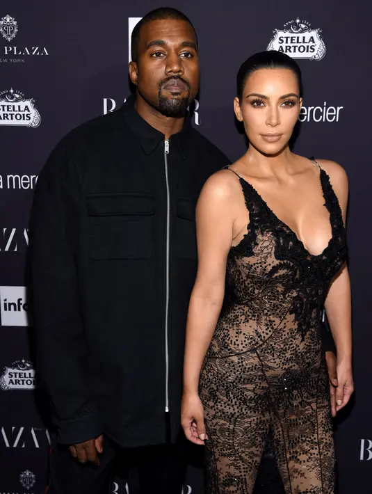Sebagai seorang istri, Kim Kardashian yang memiliki jadwal untuk hadir di Angel Ball di New York City terpaksa pulang menuju Los Angeles untuk mendampingi sang suami. (AFP/Bintang.com)