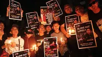Relawan dari Gerakan Sepak Bola untuk Rakyat (GSR) menggelar aksi damai bertajuk“1000 Lilin & Doa Bersama untuk Sepak Bola Indonesia” di Gedung Joang 45, Jakarta Pusat, Selasa (4/4/2023). (Dok. GSR)