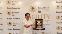 Direktur Sido Muncul, Irwan Hidayat saat menerima penghargaan Bisnis Indonesia Awards 2024.