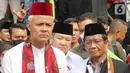 "Kira-kira kalau nanti mau coblos, yang Anda ingat-ingat apa? Oh nomernya. Apalagi? Rambut putih," terang Ganjar. (Liputan6.com/Herman Zakharia)