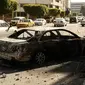 Dampak huru-hara di ibu kota Libya, Sabtu (27/8/2022). Dok:&nbsp;AP Photo/Yousef Murad