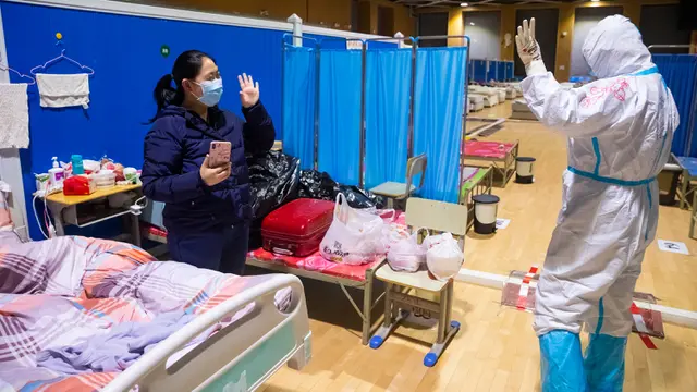 Suasana Haru Perpisahan Pasien Corona dengan Petugas Medis di Wuhan