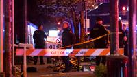 Polisi mengamankan lokasi kejadian setelah sebuah mobil menabrak kerumunan di Festival Lapu Lapu di Vancouver, Kanada. (Rich Lam/AP)