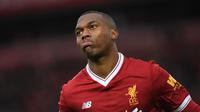 Penyerang Liverpool, Daniel Sturridge, kabarnya lebih memilih pindah ke Sevilla ketimbang Inter Milan pada bursa transfer Januari 2018 ini. (AFP/Paul Ellis)