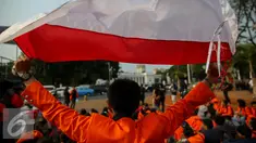 Mahasiswa Universitas Atma Jaya saat menggelar aksi damai di depan Istana Merdeka, Jakarta, Jumat (25/9/2015). Mereka meminta pemerintah menuntaskan pelanggaran HAM 16 Tahun lalu dalam tragedi Semanggi II. (Liputan6.com/Faizal Fanani)