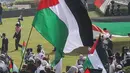 Terdengar peserta aksi meneriakkan kemerdekaan Palestina yang saat ini tengah dijajah Israel. (Liputan6.com/Angga Yuniar)