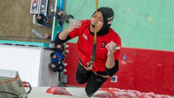 Ekspresi Aries Susanti saat sukses menjadi yang tercepat (Dok: Eddie Fowke/IFSC)