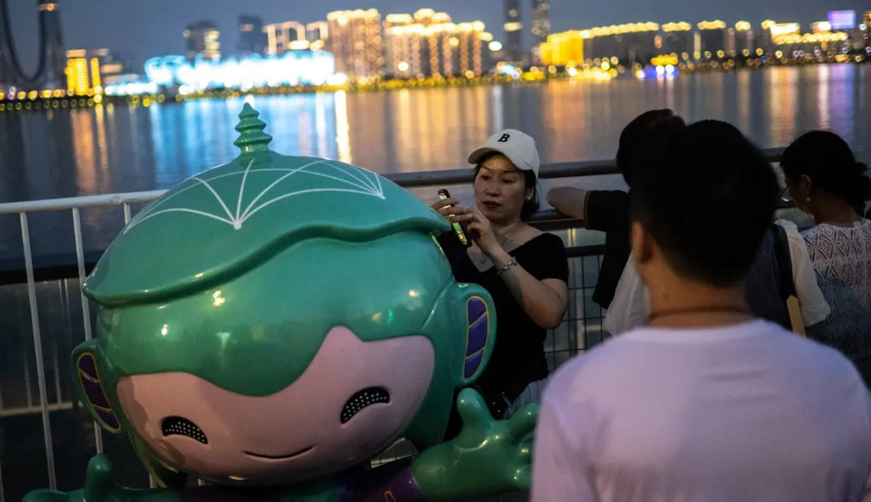 Sebagai lokasi pembukaan Asian Games 2023, Hangzhou Olympic Sports Centre Stadium juga dikenal dengan julukan The Big Lotus. Hal ini dikarenakan desain arsitekturnya yang menyerupai raksasa bunga teratai. (Philip FONG/AFP)