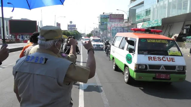 BPBD Kabupaten Banyumas menggelar konvoi kampanye ‘Siap Untuk Selamat’ bersama TNI, POLRI, dan organisasi perangkat daerah (OPD), serta organisasi kemanusiaan lainnya di HKBN 2021. (Foto: Liputan6.com/Eddy Wahono)
