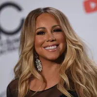 Mariah Carey saat menghadiri American Music Awards 2018, 9 Oktober 2018, di Los Angeles, California. (VALERIE MACON / AFP/Asnida Riani)