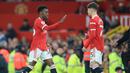 Laga debutnya justru telah terjadi di pekan ke-37 Liga Ingris 2021/2022 saat MU bermain imbang 1-1 dengan tamunya Chelsea (28/4/2022). Saat itu ia dimasukkan Ralf Rangnick hanya 1 menit sebelum waktu normal berakhir menggantikan Anthony Elanga. (AFP/Lindsey Parnaby)