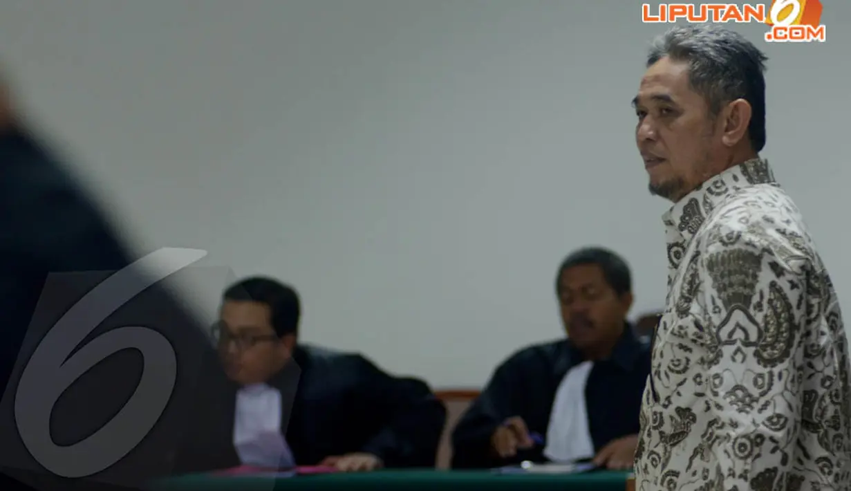 TB Muhammad Noor didakwa oleh JPU karena telah melakukan kejahatan melawan hukum atas jabatannya dalam kasus dugaan korupsi proyek pembangunan Pusat Pendidikan Pelatihan dan Sekolah Olahraga Nasional (P3SON) Hambalang (Liputan6.com/Johan Tallo)