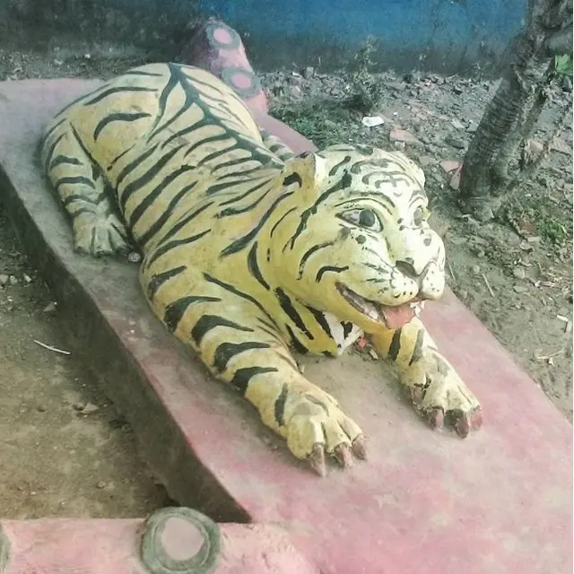 patung macan kocak