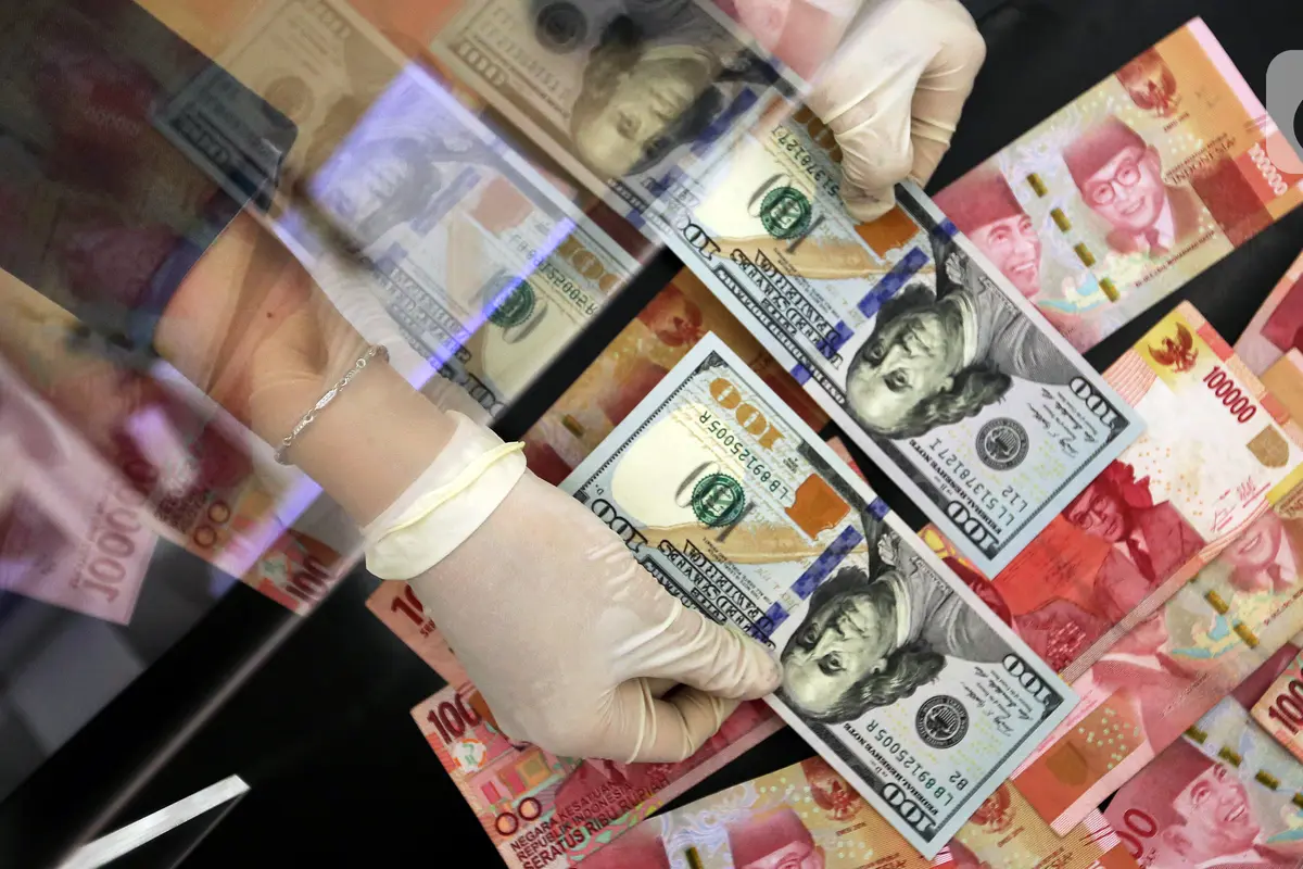 FOTO: Akhir Tahun, Nilai Tukar Rupiah Ditutup Menguat