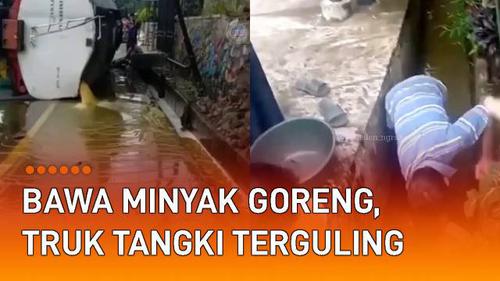 VIDEO: Bawa Minyak Goreng, Truk Tangki Terguling di Tengah Jalan