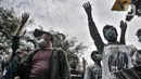 Pencari suaka menggelar unjuk rasa di depan kantor UNHCR, Jakarta, Senin (14/12/2020). Mereka meminta agar proses perpindahan ke negara tujuan dipercepat setelah adanya tiga orang pengungsi yang bunuh diri dalam dua minggu terakhir karena depresi. (merdeka.com/Iqbal Nugroho)