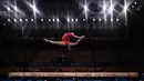 Atlet senam asal China, Tang Xijing bertanding dalam final senam artistik putri pada Olimpiade Tokyo 2020 di Ariake Gymnastics Center, Tokyo, Selasa (3/8/2021). (Foto: AFP/Jeff Pachoud)