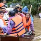 Media pemerintah setempat merilis, hingga saat ini bencana yang terjadi di Vietnam Utara telah menewaskan 63 orang dan 40 lainnya hilang. (Nhac NGUYEN/AFP)