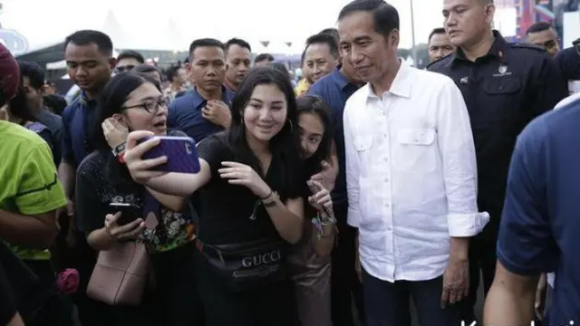 Jokowi nonton WTF 2018 (Hak Cipta: KapanLagi.com®/Agus Apriyanto/ssm)