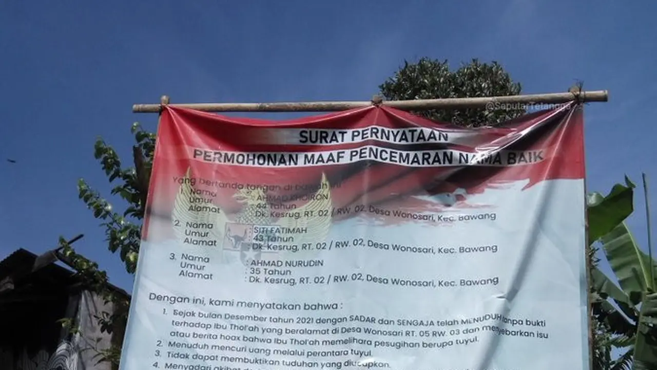 Permohonan maaf pakai baliho besar di Desa Wonosari, Kecamatan Bawang.