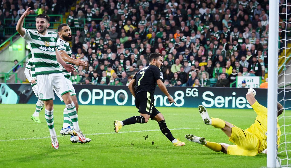 Real Madrid sukses melumat tuan rumah Celtic tiga gol tanpa balas pada laga perdana Grup F Liga Champions yang digelar di Celtic Park, Glasgow, Selasa (6/9/2022). (AFP/Andy Buchanan)