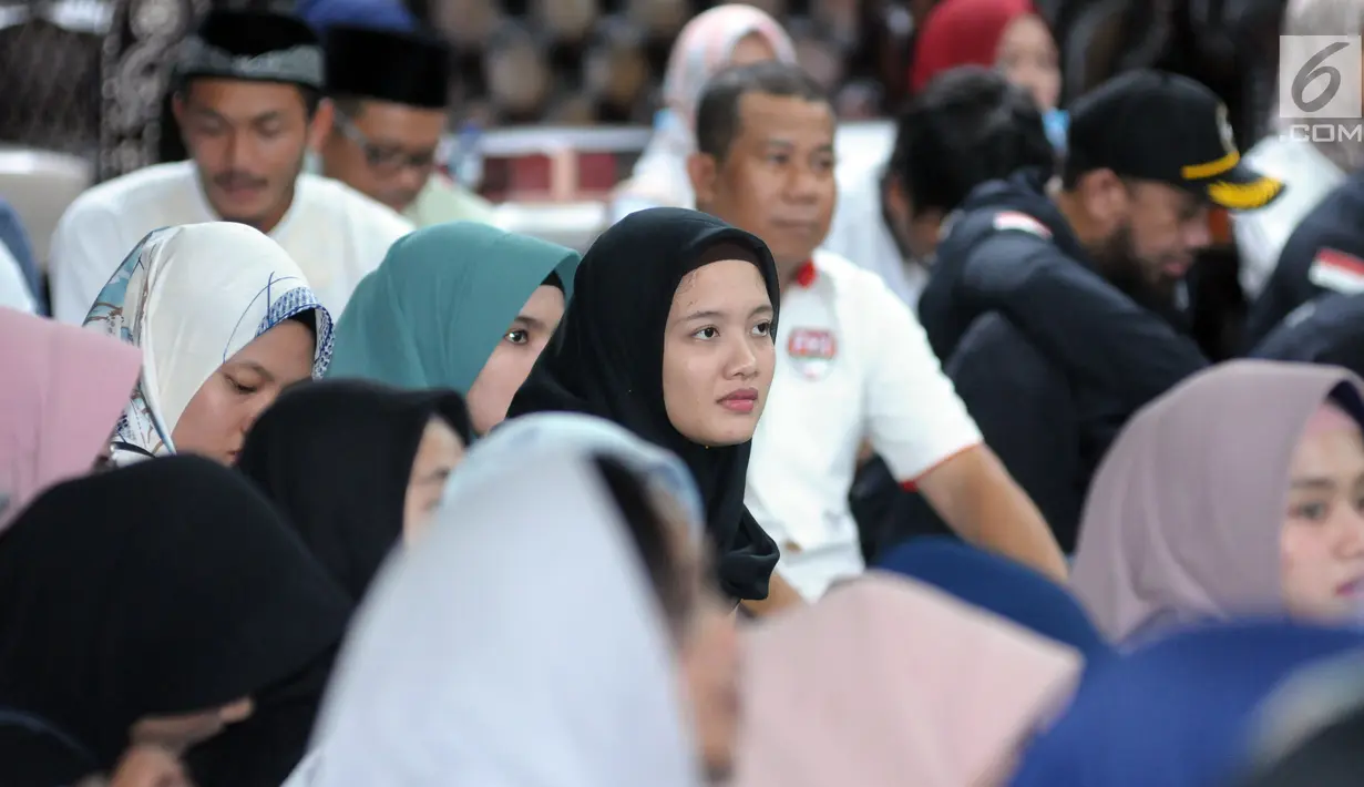 Pevoli putri Indonesia, Wilda Siti Nurfadhilah saat menghadiri buka puasa bersama Menpora Imam Nahrawi di Jakarta, Senin (28/5). Acara tersebut dihadiri atlet pelatnas Asian Games 2018 dan para mantan atlet peraih medali. (Liputan6.com/Helmi Fithriansyah)