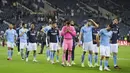 Para pemain Manchester City tampak kecewa usai ditaklukkan Chelsea pada laga final Liga Champions di Stadion Dragao, Porto, Minggu (30/5/2021). City takluk dengan skor 1-0. (Jose Coelho/Pool via AP)