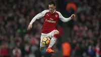 Legenda Arsenal, Ian Wright mendukung rencana Manchester united mendatangkan Mesut Ozil pada musim panas 2018 (AFP Photo/Daniel Leal Olivas)