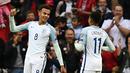 Ekspresi Dele Alli setelah mencetak gol ke gawang Malta pada laga Grup F kualifikasi Piala Dunia 2018 zona Eropa di Stadion Wembley, London, Sabtu (8/10/2016). (AFP/Justin Tallis)