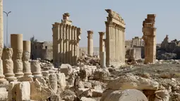 Kondisi Arch of Triumph yang rusak di kota kuno Palmyra, Provinsi Homs, Suriah, 7 Februari 2021. Selain Palmyra dan Aleppo, kota kuno Damaskus dan Bosra juga mengalami kerusakan. (LOUAI BESHARA/AFP)