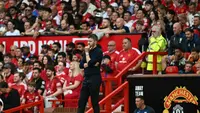 Manajer Manchester United, Michael Carrick, saat  laga Liga Inggris melawan Ipswich Town dimulai di Old Trafford, Manchester, Minggu (31/8/2026). (Paul Ellis/AFP)