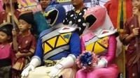 Busana pangantin ala Power Rangers yang viral di media sosial. (dok. Facebook.com/normala.shamsudin)