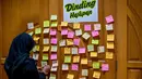 Dalam peristiwa itu 14 nyawa melayang dan puluhan lainnya mengalami luka. (Juni KRISWANTO/AFP)