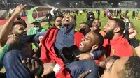 Timnas Kamerun berselebrasi setelah memastikan lolos ke Piala Dunia 2022. (AFP)