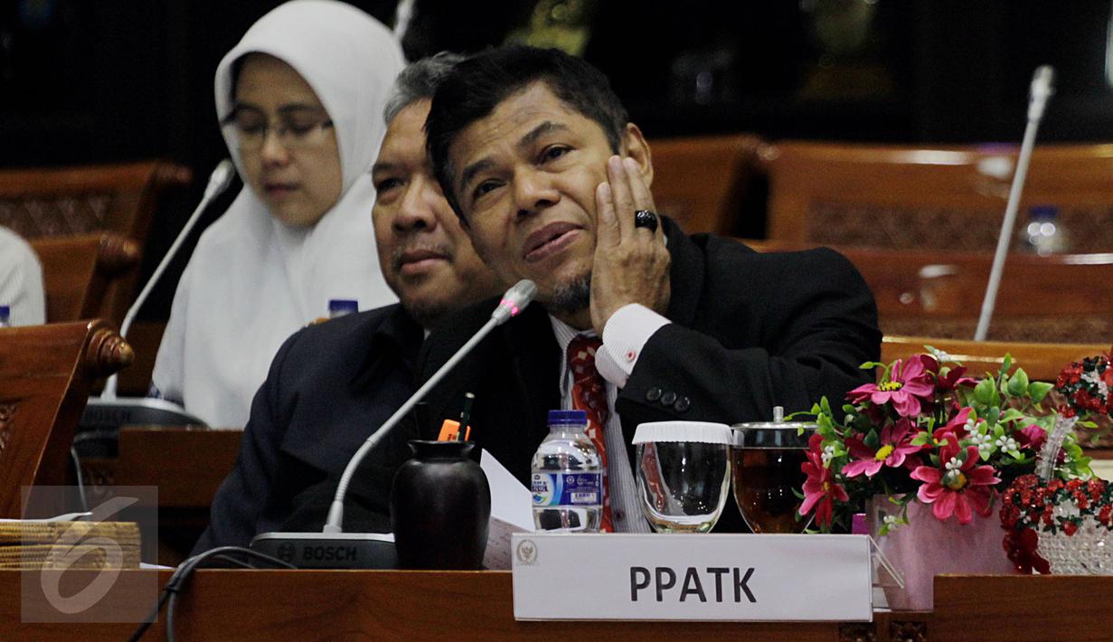  Kepala Pusat Pelaporan dan Analisis Transaksi Keuangan (PPATK) Muhammad Yusuf mengikuti Rapat Dengar Pendapat (RDP) dengan Komisi III DPR Di Kompleks Parlemen, Senayan, Jakarta, Kamis (11/2). (Liputan6.com/Johan Tallo)
