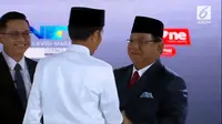 Calon presiden Jokowi dan Prabowo Subianto saat debat capres kelima 2019. (Liputan6.com)