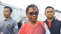 Menteri Koordinator Bidang Politik, Hukum dan Keamanan (Menko Polhukam) Mahfud Md di kawasan Monas, Jakarta Pusat, Minggu (25/6/2023). (Merdeka.com)