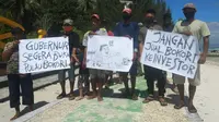Warga Suku Bajo protes penutupan lokasi wisata pulau Bokori di tengah Pandemi.
(Liputan6.com/Ahmad Akbar Fua)