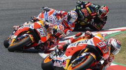 Pebalap Repsol Honda, Marc Marquez, saat balapan di MotoGP Catalunya, Barcelona, Minggu (11/6/2017). Marquez finis di posisi kedua dengan waktu 44 menit 45,062 detik. (AFP/Josep Lago)