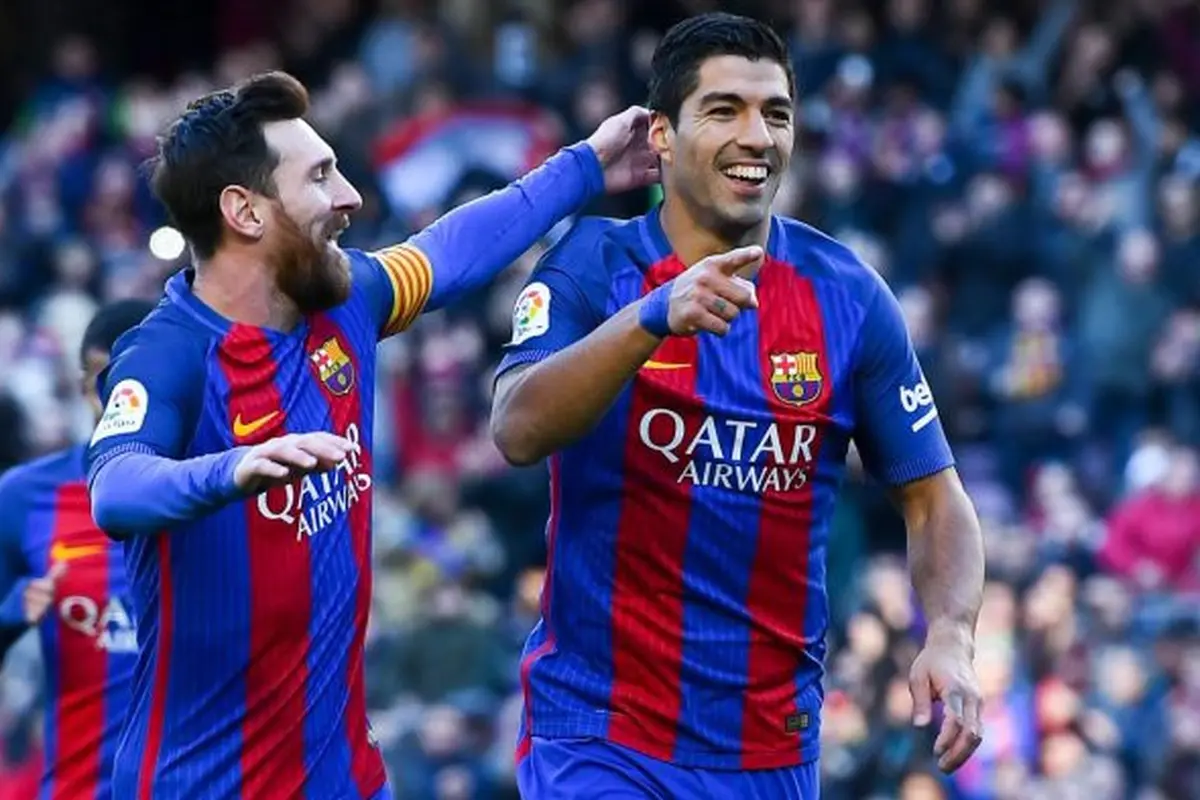 Lionel Messi dan Luis Suarez
