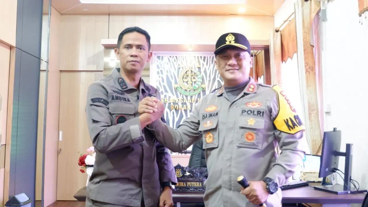 Kapolres Rokan Hilir AKBP Isa Imam Syahroni bersama Kepala Kejari setempat.