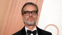 ktor Inggris Guy Pearce Pakai Pin Bebaskan Palestina di Oscar 2025.&nbsp; &nbsp;(Mike Coppola / GETTY IMAGES NORTH AMERICA / Getty Images via AFP)