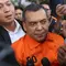Wakil Menteri Imigrasi dan Pemasyarakatan (Wamen Imipas), Silmy Karim, saat menuju mobil tahanan usai menjalani pemeriksaan intensif di Gedung Merah Putih Komisi Pemberantasan Korupsi (KPK), Jakarta, Kamis (4/6/2026). (Liputan6.com/Helmi Fithriansyah)