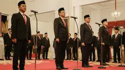 Bahlil Lahadalia sebagai Menteri ESDM menggantikan Arifin Tasrif, dan Supratman Andi Agtas sebagai Menkumham menggantikan Yasonna Laoly. (Yasuyoshi CHIBA / AFP)